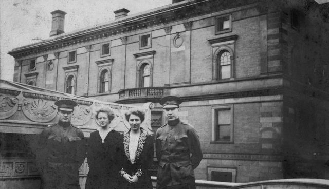 From right: Burton J. Lee, Louise Freeman Lee, Helen Clay Frick, and unidentified soldier [Fordyce B. St. John?] on the roof of the Frick residence at One East 70th Street in New York.